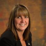 headshot of female Educational Foundation Board member Carol Curtis